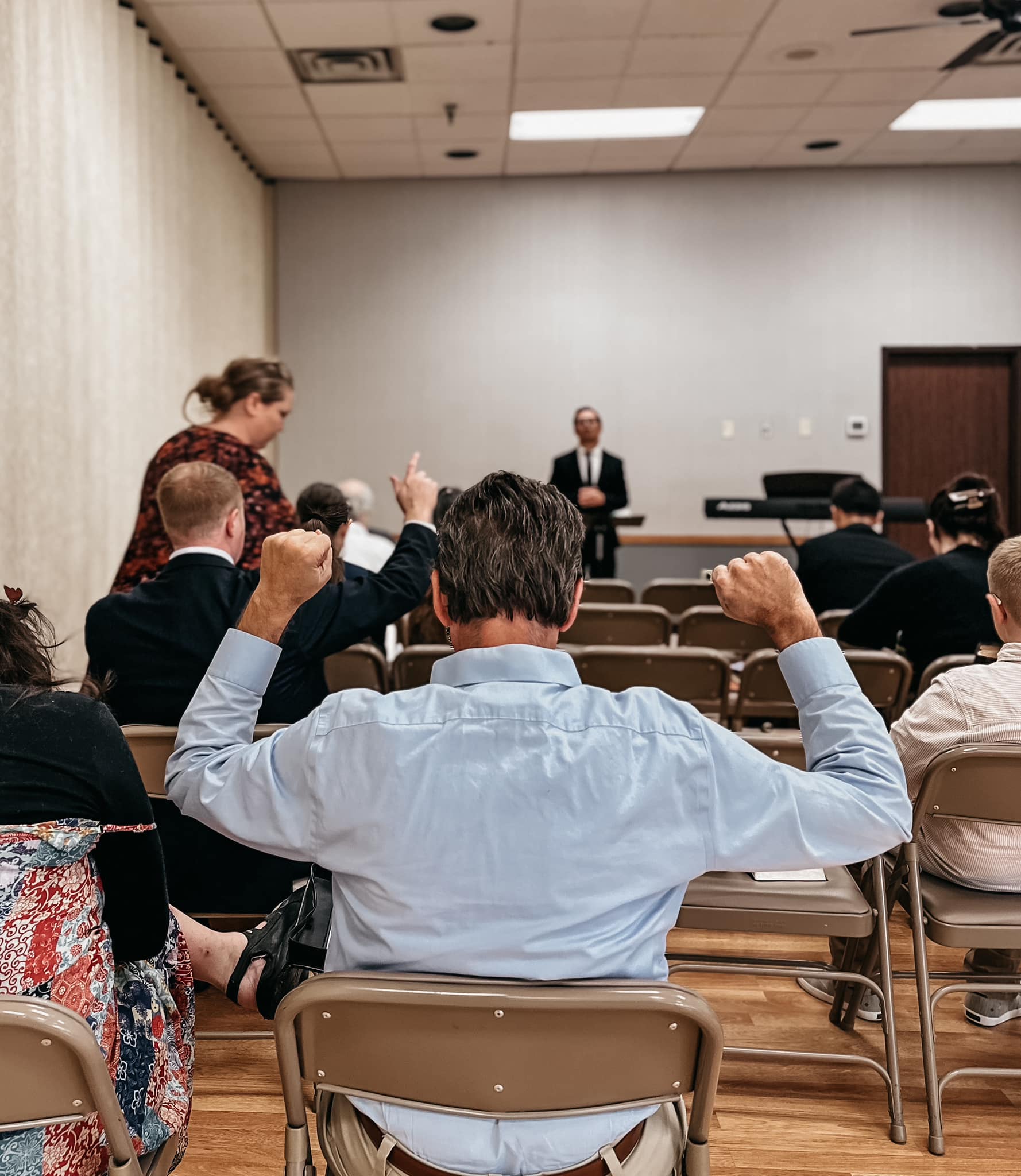 Prayer during a Next Town Ministries gathering