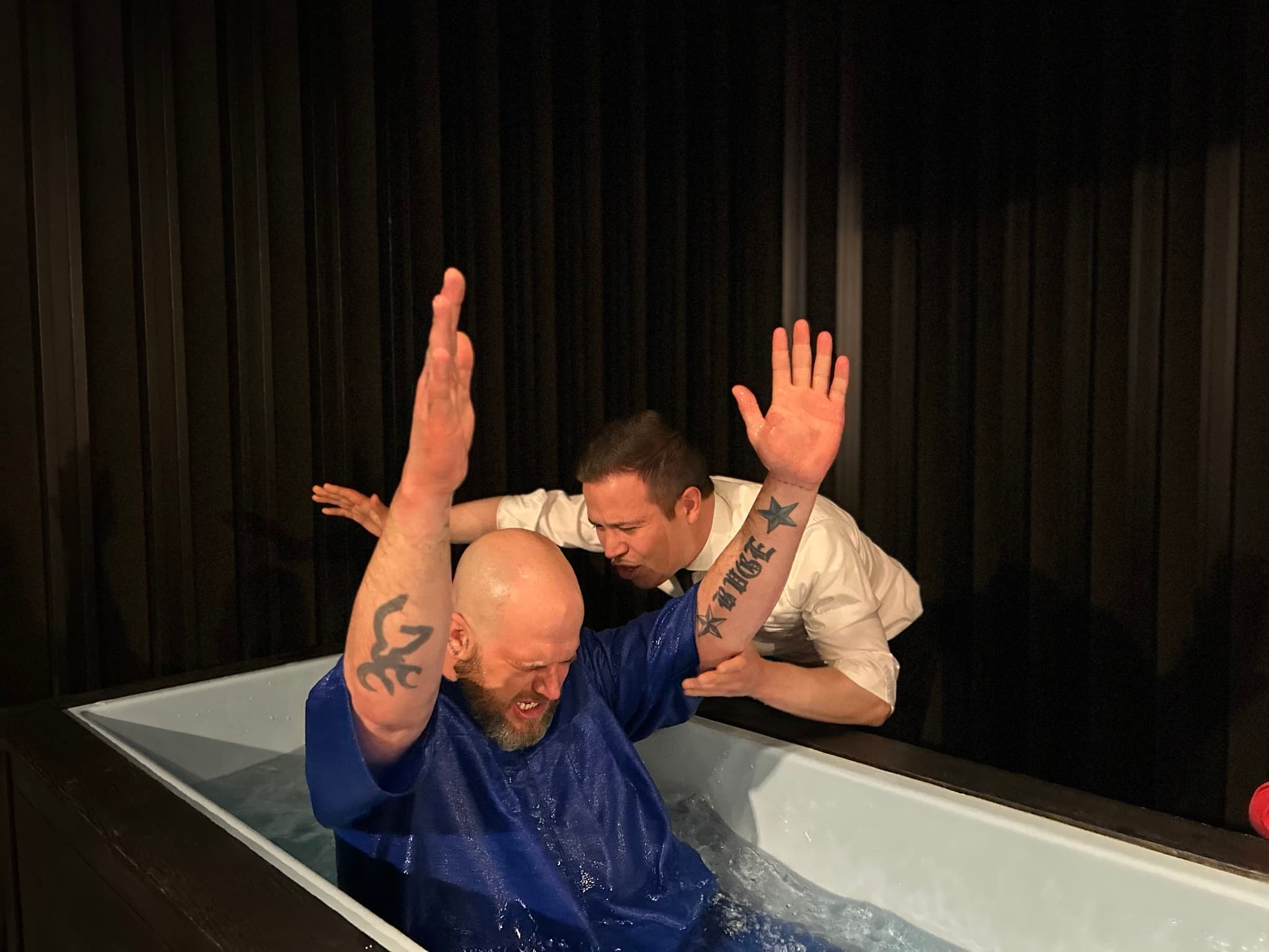 A baptism during a Next Town Ministries service